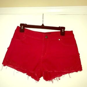Red cutoff shorts size M